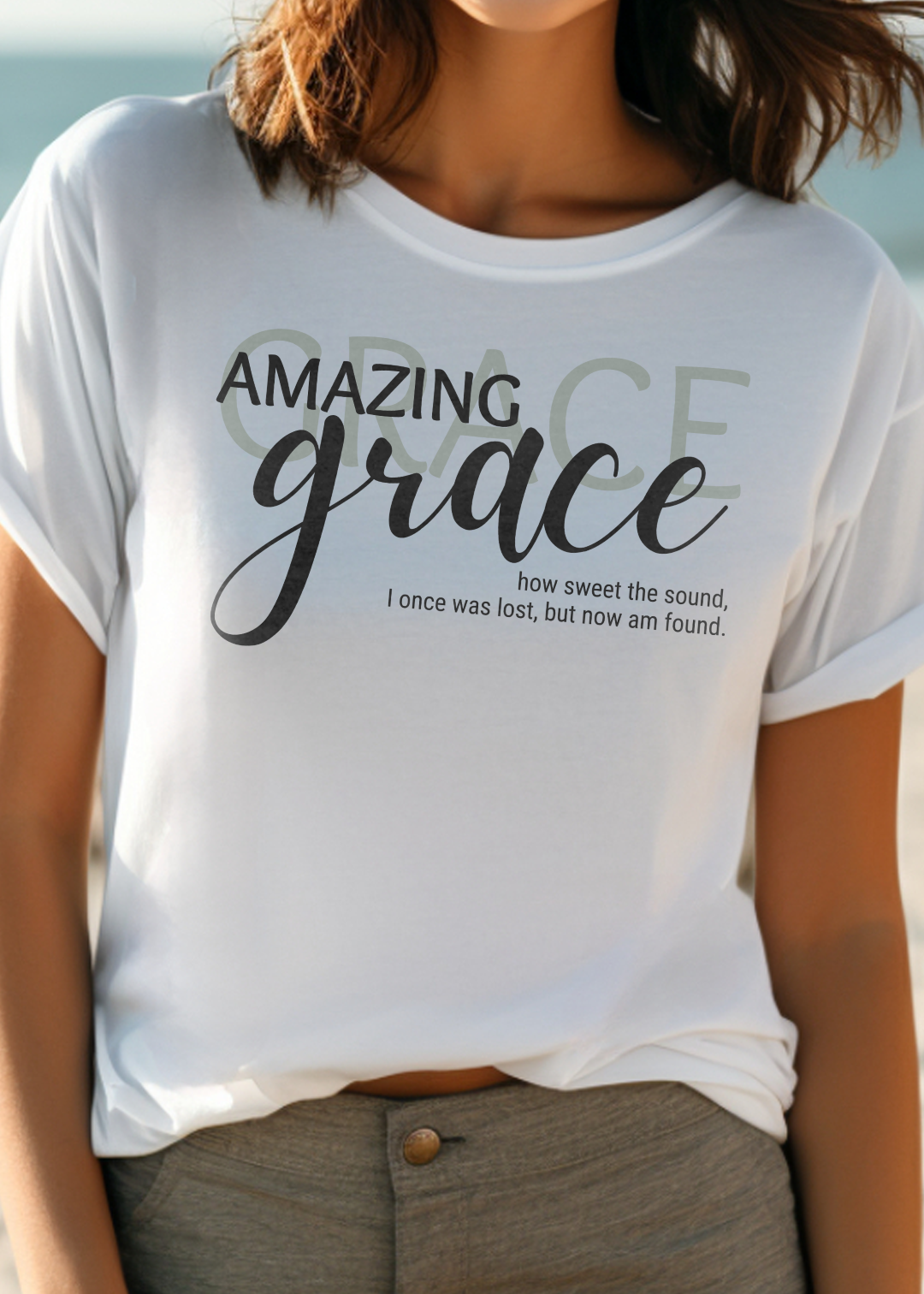 White Christian T-Shirt with "Amazing Grace: how sweet the sound, I once was lost, but now am found" print design. Crew neck, short-sleeved, classic fit, soft fabric