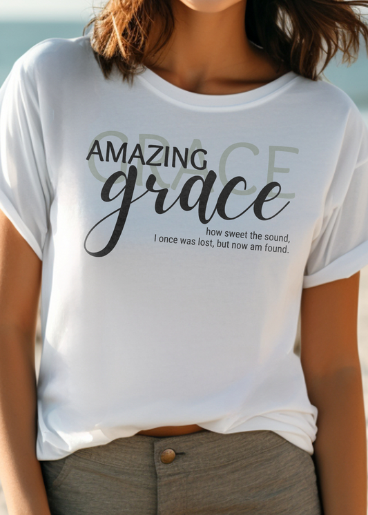 White Christian T-Shirt with "Amazing Grace: how sweet the sound, I once was lost, but now am found" print design. Crew neck, short-sleeved, classic fit, soft fabric