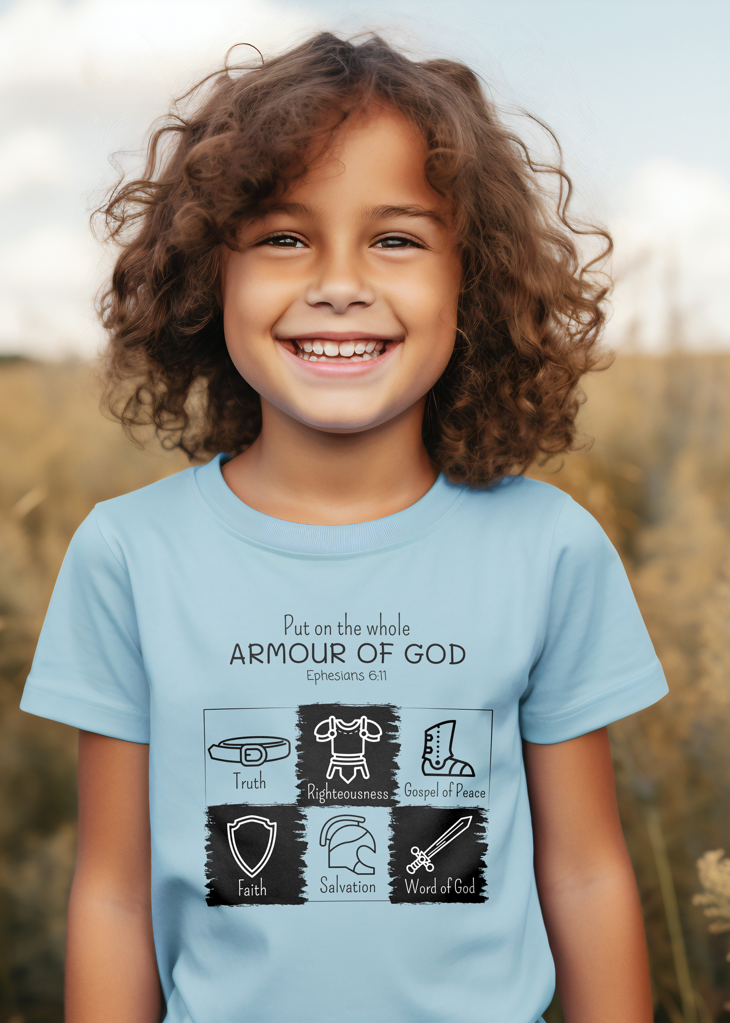 Light blue kid's Christian t-shirt with "Put on the Whole Armour Of God" print design with armour of God graphics. Unisex, classic retail fit, crew neck, and with shoulder-to-shoulder taping