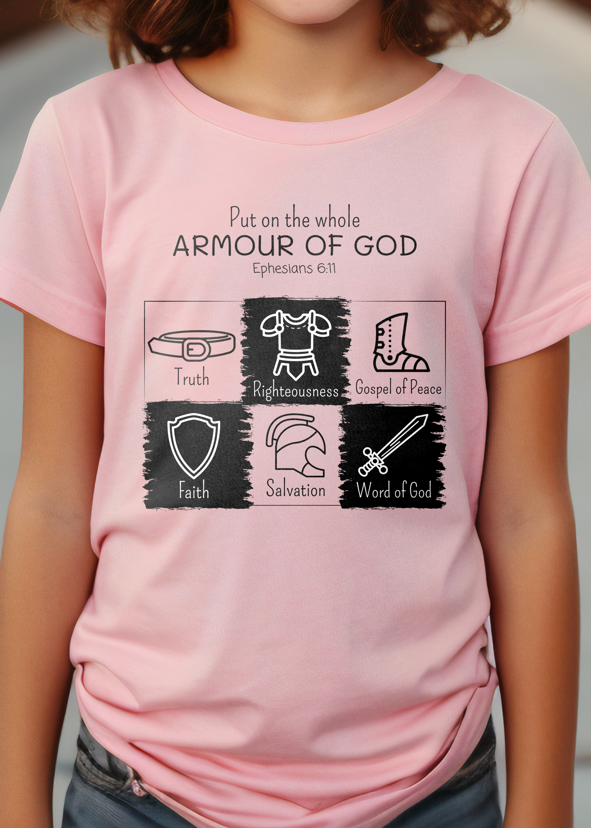 Pink kid's t-shirt with "Put on the Whole Armour Of God" print design with armour of God graphics. Unisex, classic retail fit, crew neck, and with shoulder-to-shoulder taping