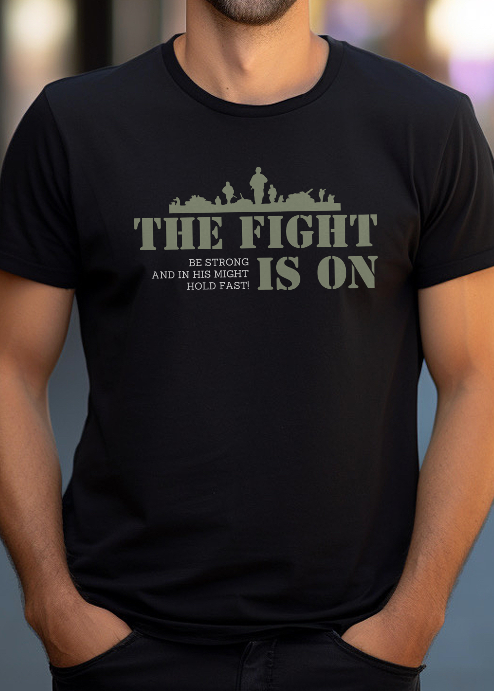 Black Christian T-Shirt with "The Fight Is On: Be Strong and in His Might Hold Fast" print design. Crew neck, short-sleeved, classic fit, soft fabric