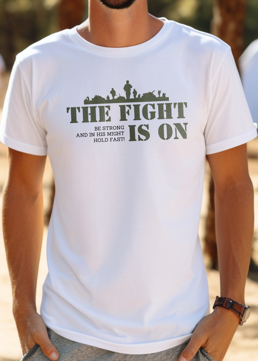 Black Christian T-Shirt with "The Fight Is On: Be Strong and in His Might Hold Fast" print design. Crew neck, short-sleeved, classic fit, soft fabric