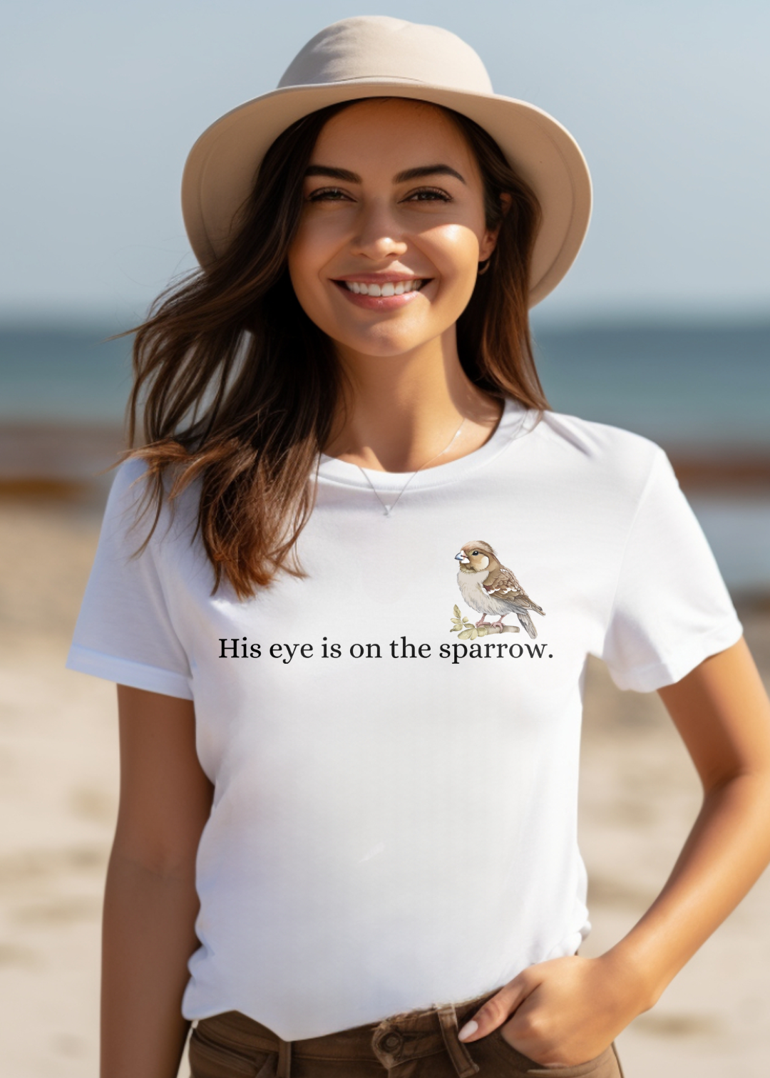 White Christian T-Shirt with "His Eye is on the Sparrow" print design. Crew neck, short-sleeved, classic fit, soft fabric