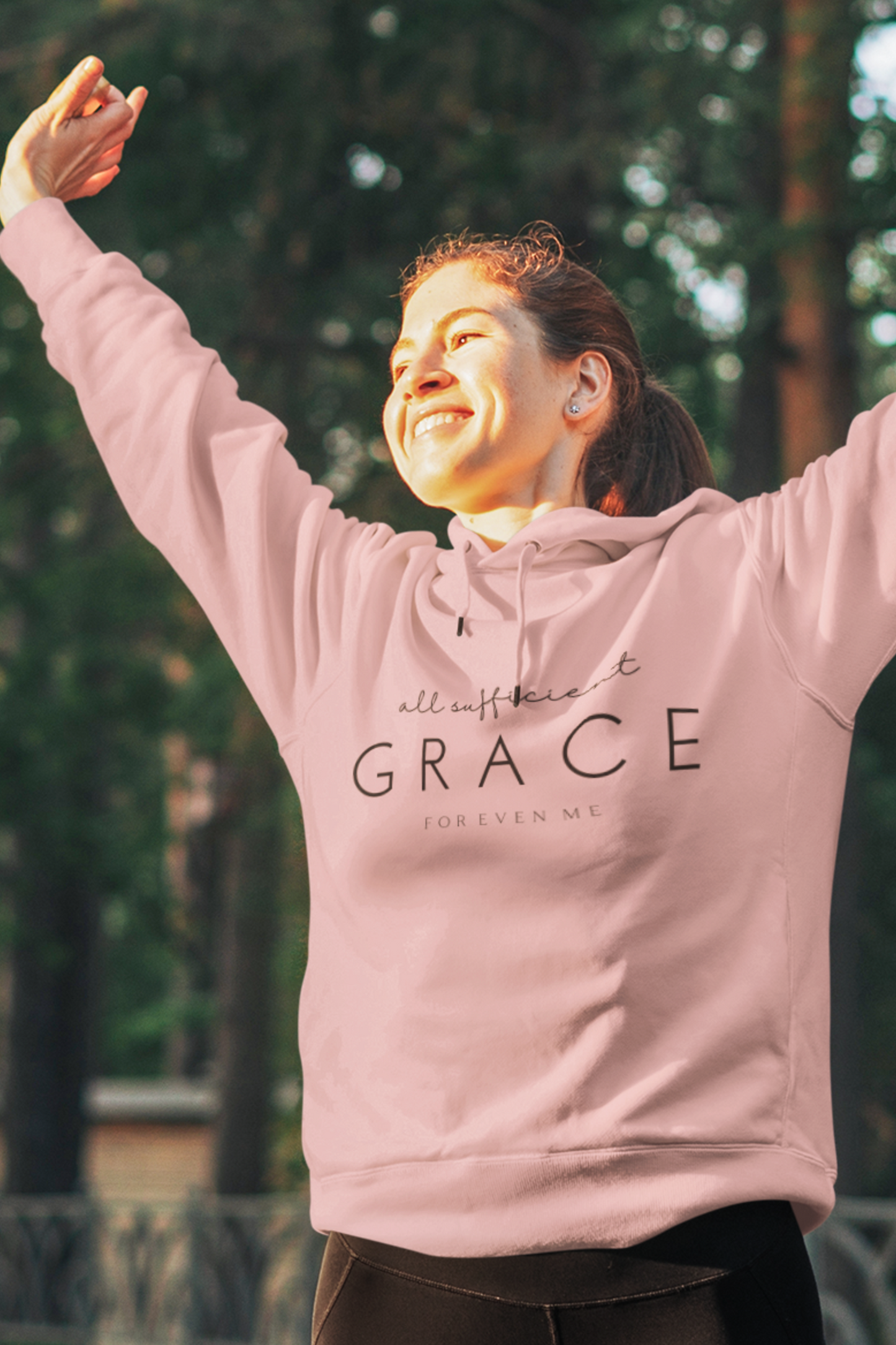 Pink Christian Hoodie with "All Sufficient Grace For Even Me" print design on the front. Pullover, with large pouch pocket on the front.