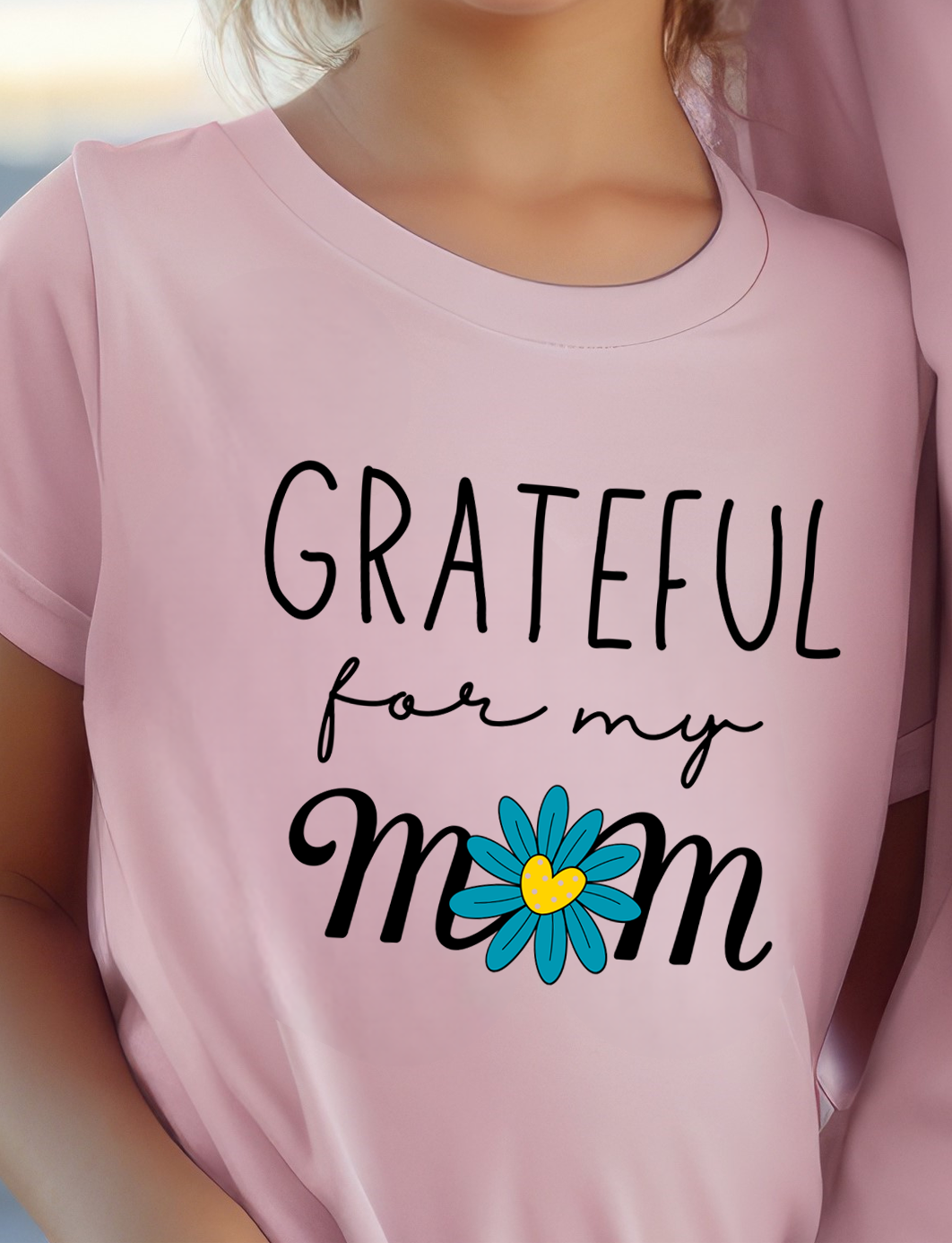 Pink Kid's Mother's Day T-Shirt with "Grateful for my Mom" print design. Crew neck, short-sleeved, classic fit