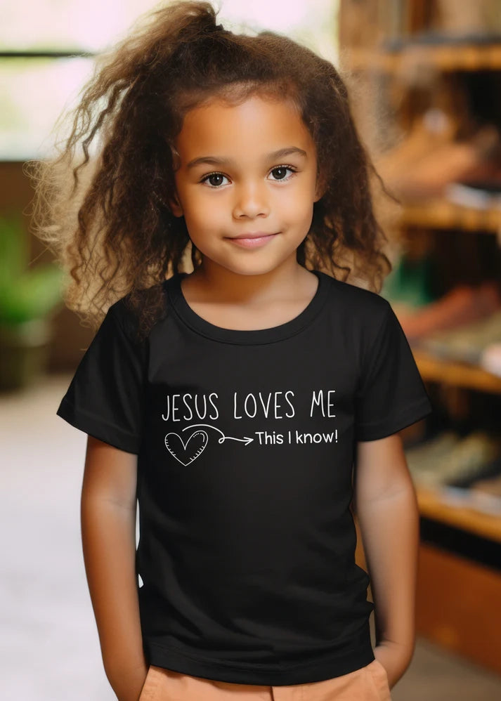 Kid's black Christian T-shirt with "Jesus loves me, this I know" print design. Crew neck, classic fit, unisex.