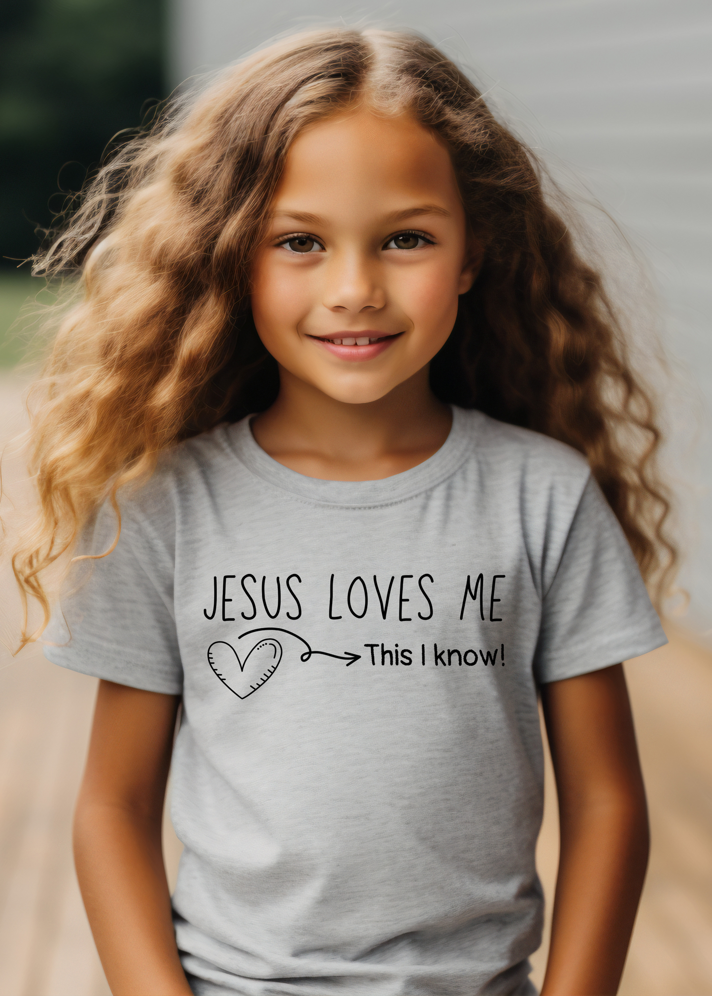 Kid's gray Christian T-shirt with "Jesus loves me, this I know" print design. Crew neck, classic fit, unisex.