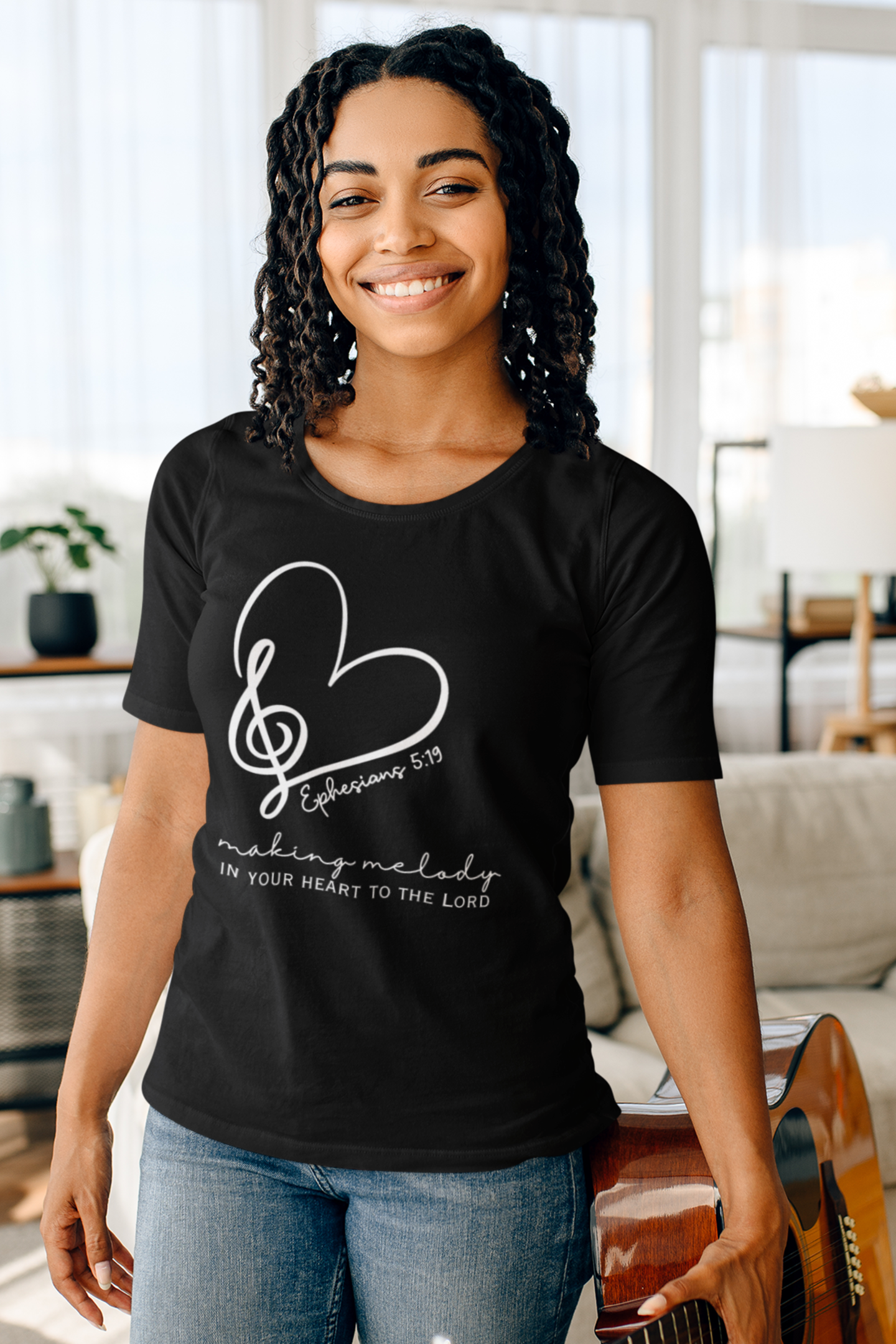 Ladies Christian T-Shirt with "Making melody in your heart to the Lord" print design. Black color, Crew neck, short-sleeved, classic retail fit.