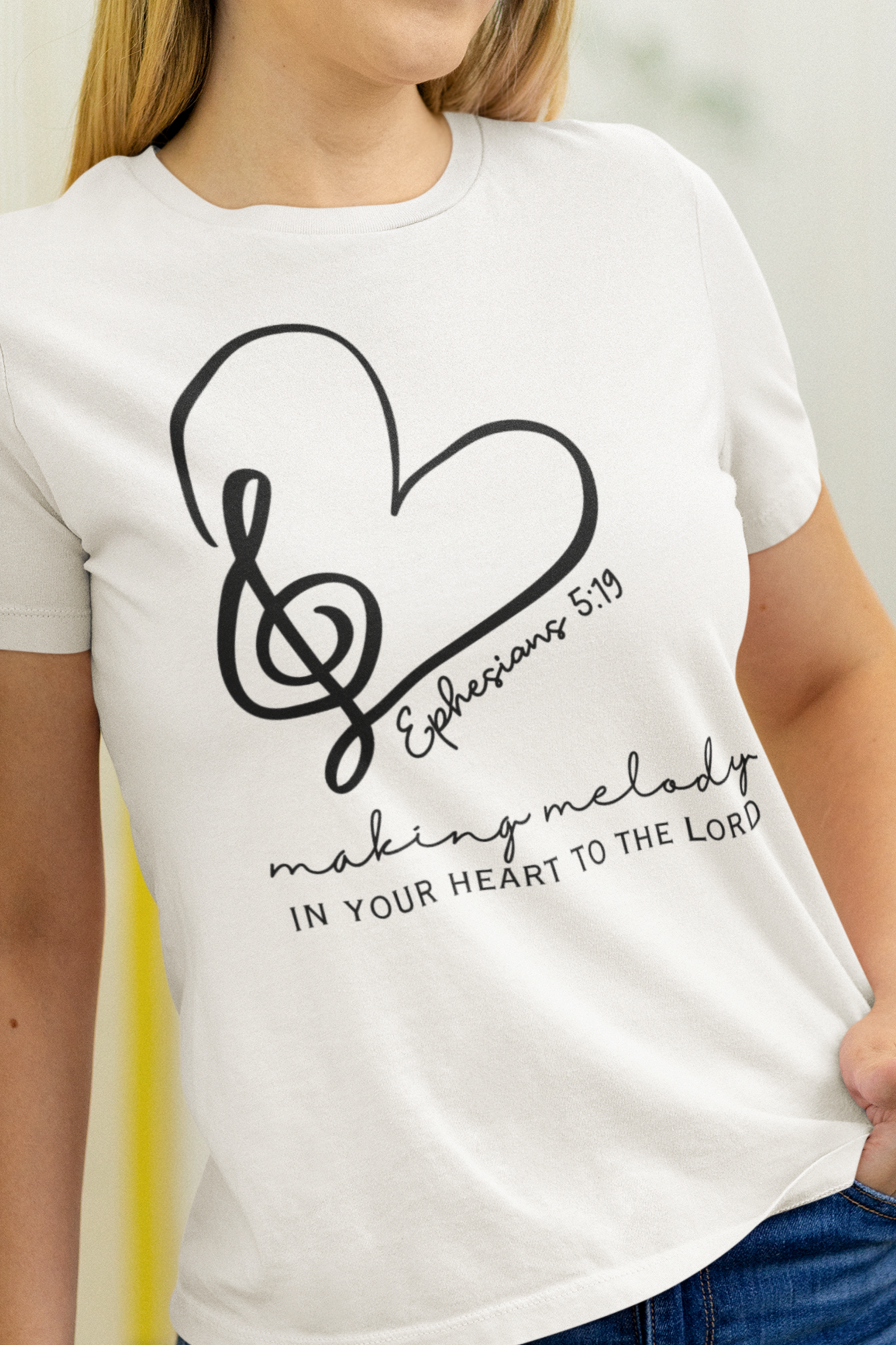 Ladies Christian T-Shirt with "Making melody in your heart to the Lord" print design. White color, Crew neck, short-sleeved, classic retail fit.