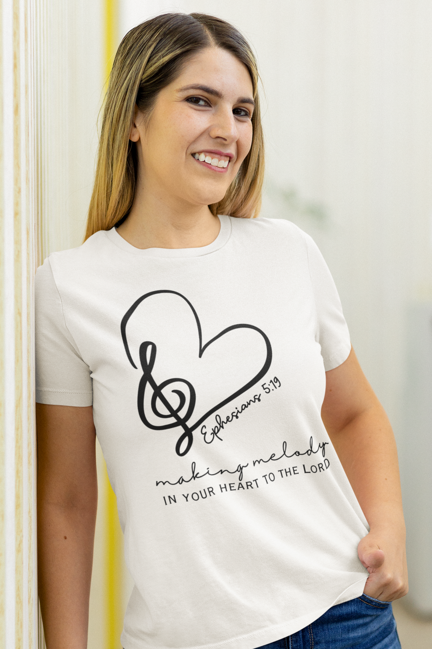 Ladies Christian T-Shirt with "Making melody in your heart to the Lord" print design. White color, Crew neck, short-sleeved, classic retail fit.