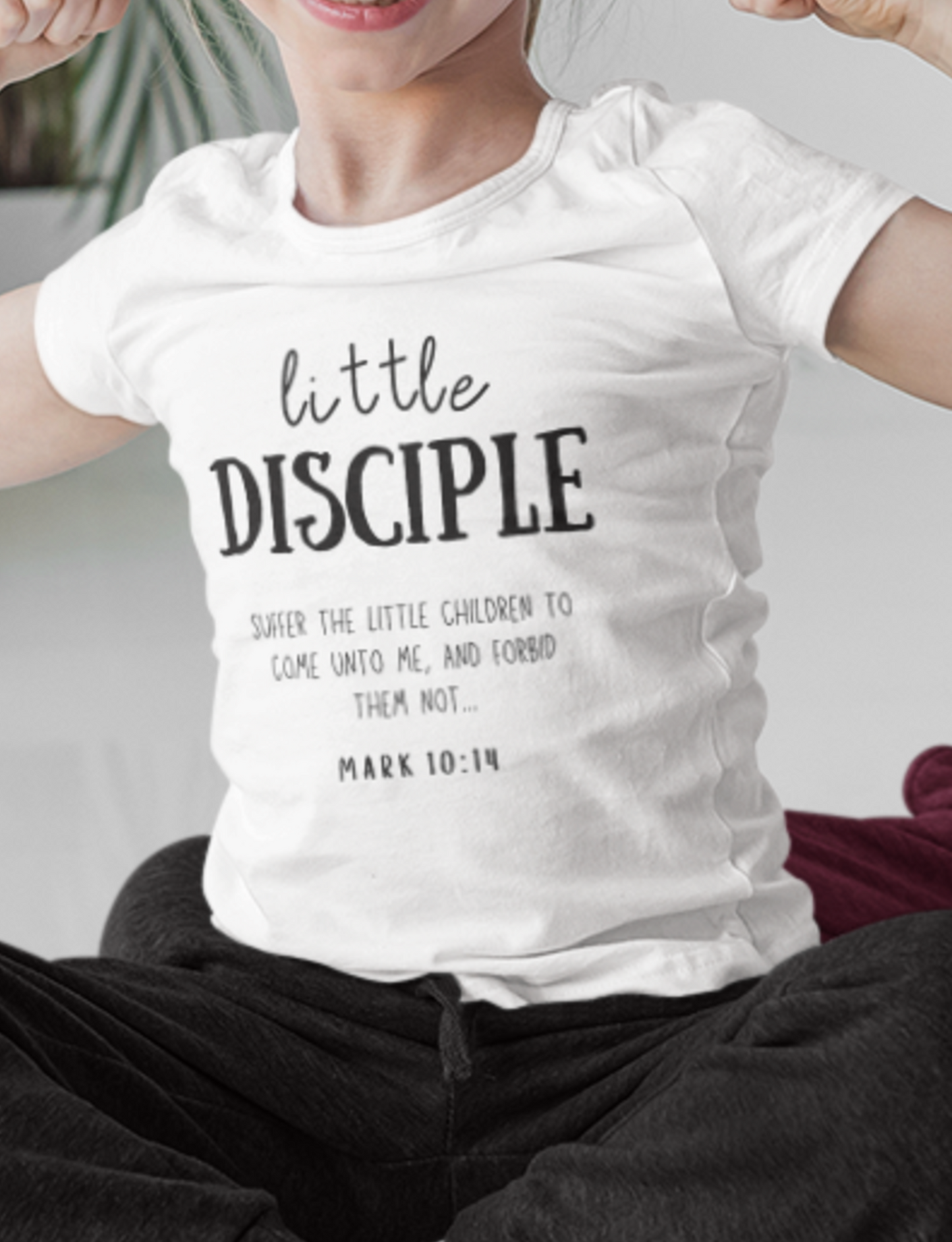 White kid's Christian Mother's Day T-shirt with "Little Disciple" print design. Crew neck, short-sleeved, unisex, classic retail fit