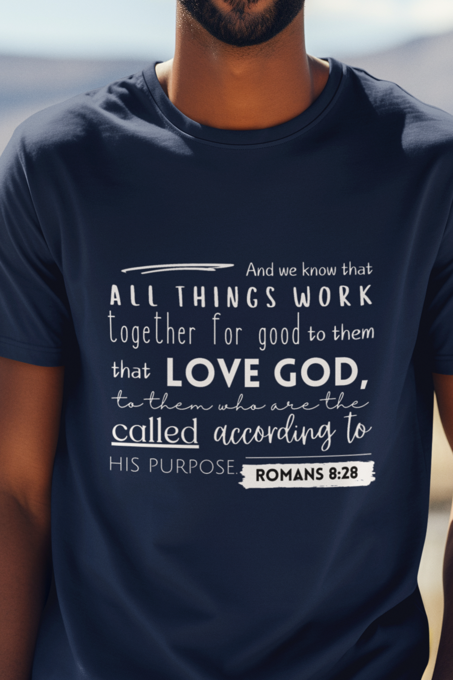  Navy Blue Christian T-Shirt with Romans 8:28 design. Crew neck, short-sleeved, classic fit