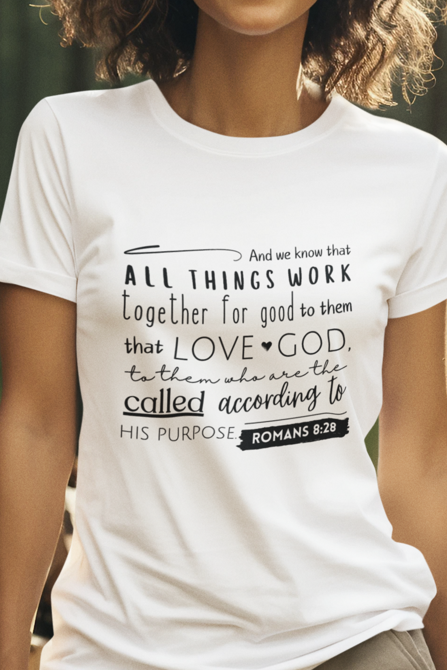 White Christian T-Shirt with Romans 8:28 KJV print design. Crew neck, Short-sleeved, classic fit