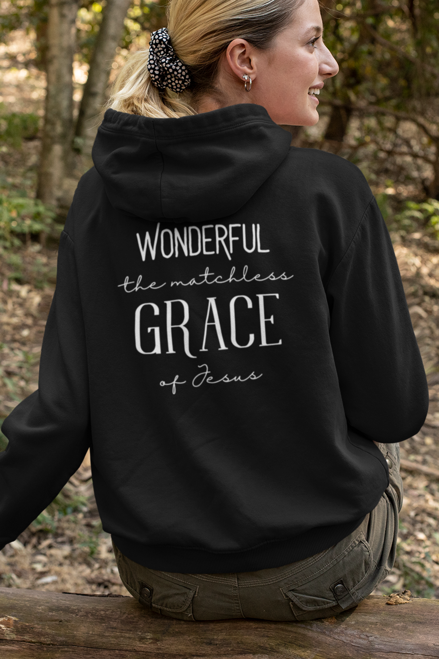 Black Christian pullover hoodie with "Wonderful the Matchless Grace of Jesus" print design at the back. With large front pouch pocket.